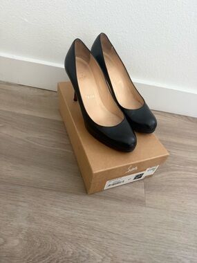 Christian Louboutin Black Leather Pumps with Red Sole Accent